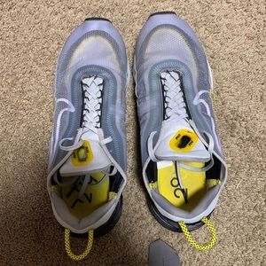 Grey yellow Nike 10.5 size shoe